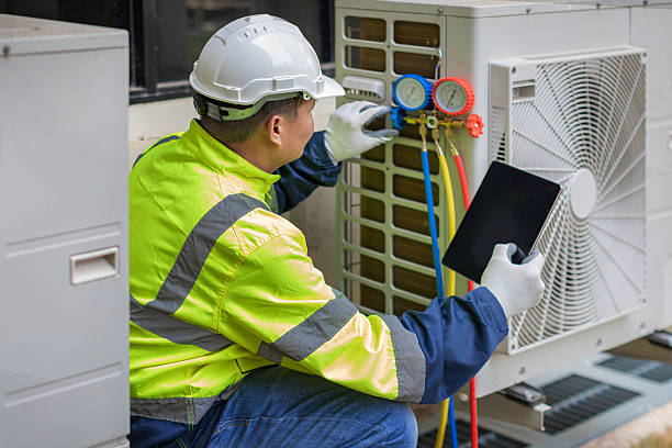 Professional Hvac technician working in Crownsville, MD